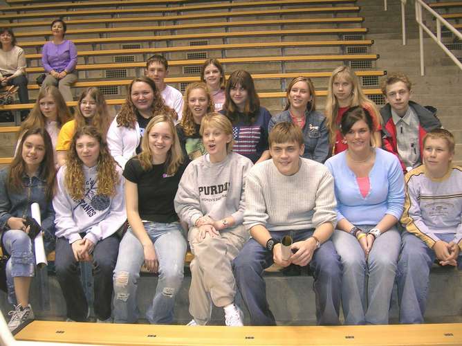 members of russian-american exchange 2004-2005 watching a basketball game